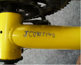 An image of a bike with an engraving.